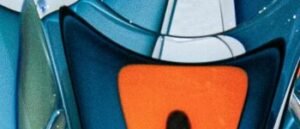 Colorful abstract glass sculpture highlighting tall, graceful forms on a white background.